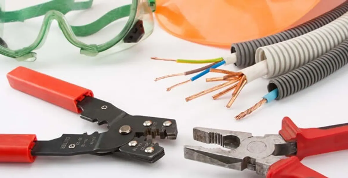 Electrical wiring repair with professional tools and safety equipment in Ashland, MO