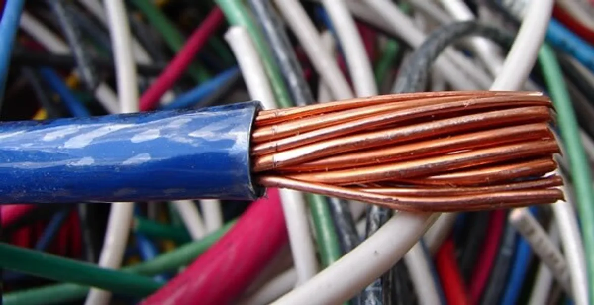 electrical wiring services showing exposed copper conductors and cable preparation in Columbia, MO