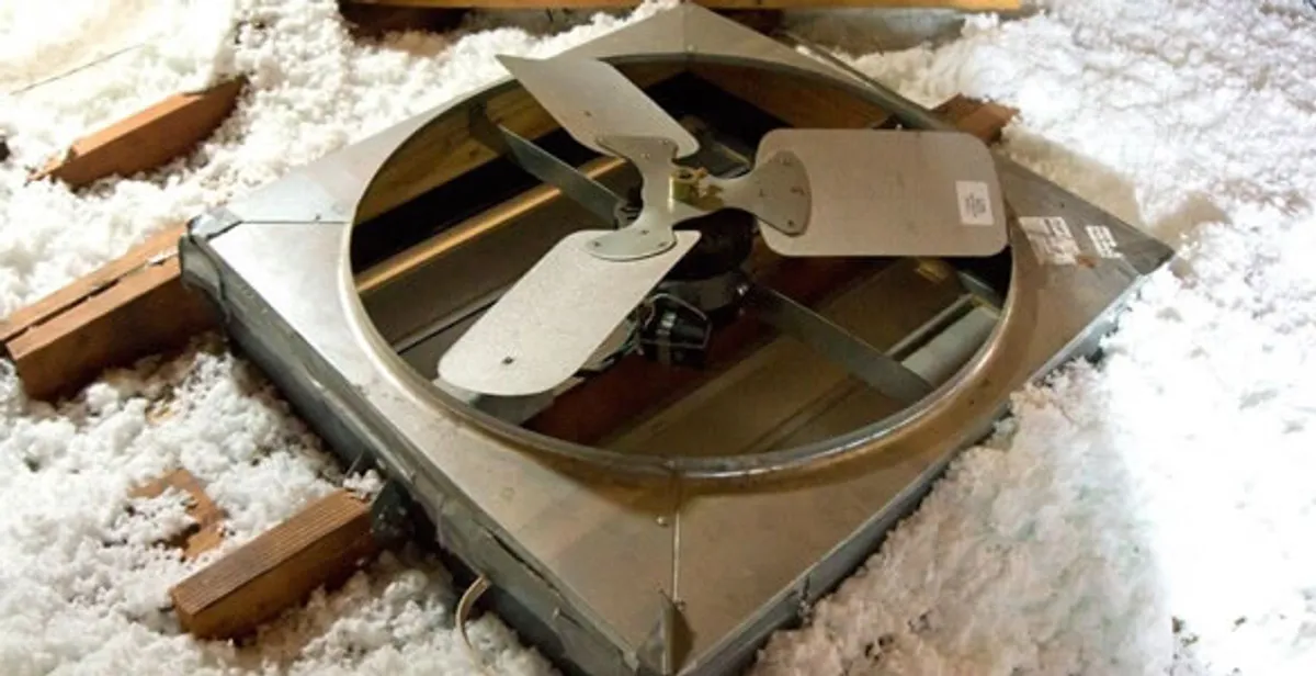 whole house fan installation services with attic-mounted ventilation unit in Columbia, MO